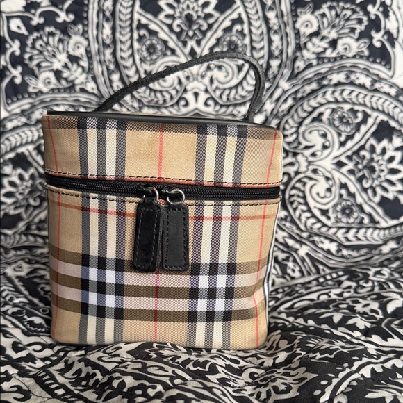 Burberry Handbags - Burbeberry canvas vanity case bag